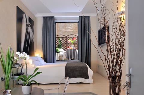 Premium bedding, memory foam beds, free minibar, in-room safe