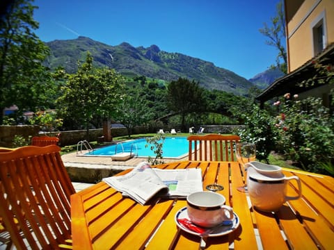 Outdoor pool, open 9 AM to 9:30 PM, sun loungers