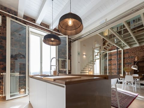 Luxury Suite, Hot Tub | Private kitchen | Full-size fridge, stovetop, espresso maker, coffee/tea maker