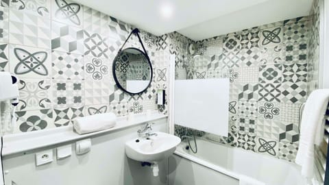 Shower, eco-friendly toiletries, hair dryer, towels