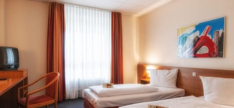 Desk, free WiFi, bed sheets