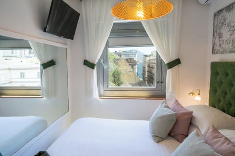 Superior Quadruple Room | Down comforters, minibar, in-room safe, desk