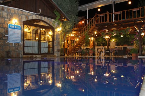 Seasonal outdoor pool, pool umbrellas, sun loungers