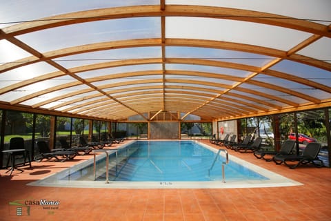 Indoor pool, open 8:00 AM to 9:00 PM, sun loungers