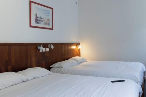 Quadruple Room, Private Bathroom | Premium bedding, in-room safe, desk, rollaway beds