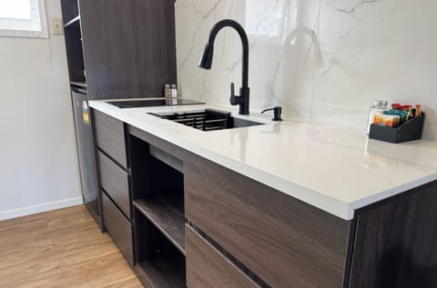 Fridge, microwave, stovetop, cookware/dishes/utensils