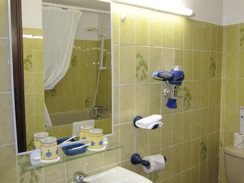 Double Room, Tower | Bathroom | Combined shower/tub, free toiletries, hair dryer, slippers