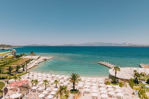 Private beach, white sand, free beach cabanas, sun loungers
