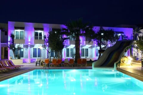 Outdoor pool, open 9:00 AM to 9:00 PM, pool umbrellas, sun loungers