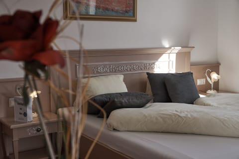 Double Room | Minibar, in-room safe, individually decorated, individually furnished