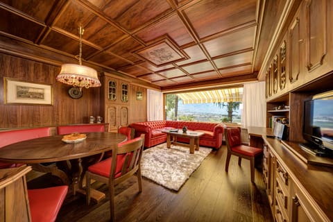 Suite, 1 Bedroom, Sauna | Living area | TV