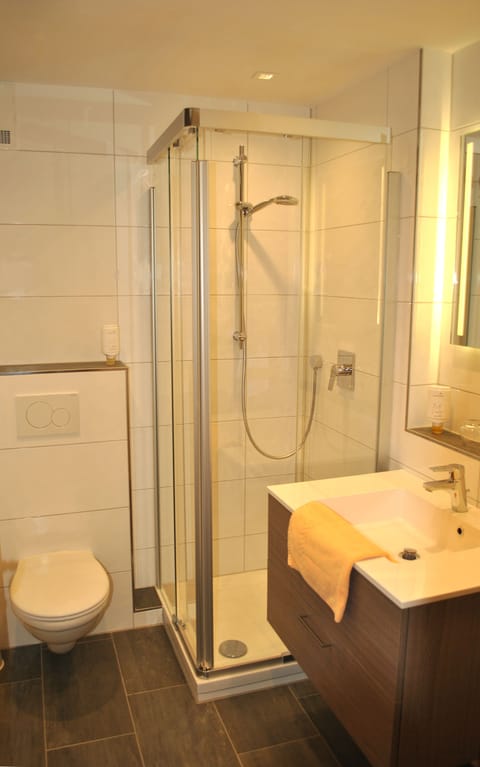 Shower, free toiletries, hair dryer, towels