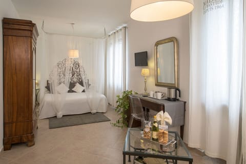 Minibar, desk, laptop workspace, iron/ironing board