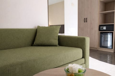 Superior Double Room, Balcony, Garden View | Living area | TV