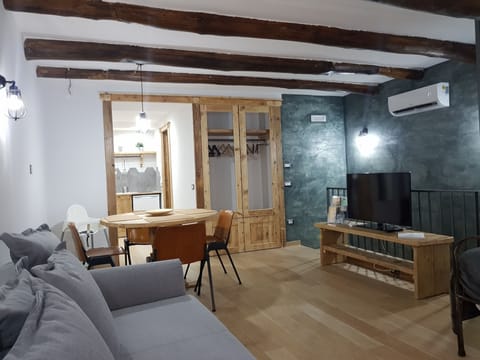 City Studio Suite, Mezzanine | Living area | 26-inch LCD TV with cable channels, TV
