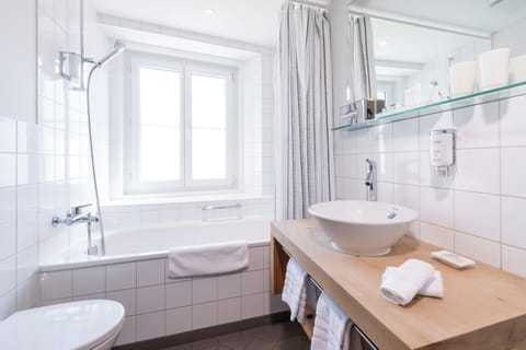 Premium bedding, down comforters, pillowtop beds, in-room safe