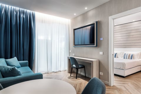 Family Apartment, 1 King Bed with Sofa bed, Kitchenette | Living area | Flat-screen TV, printers