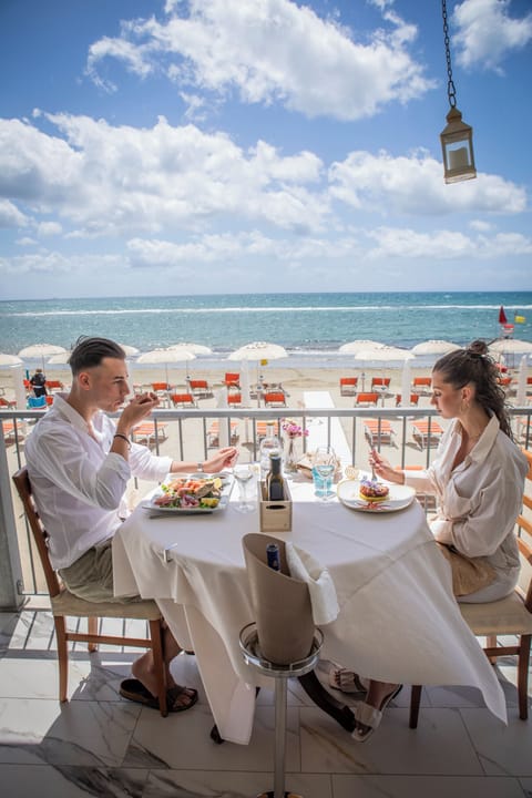 Lunch, dinner served; local cuisine, ocean views 
