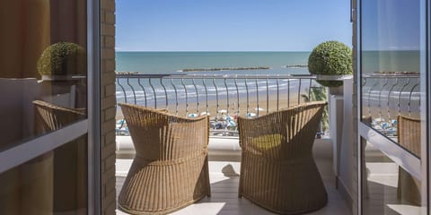 Standard Room, 1 Queen Bed, Balcony, Partial Sea View | Beach | Beach nearby, beach volleyball