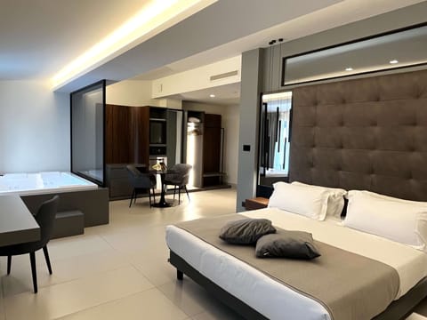 Superior Suite, 1 King Bed, Non Smoking, Balcony | Minibar, in-room safe, soundproofing, free WiFi