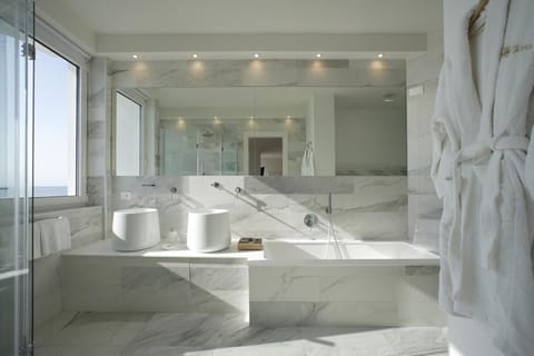 Shower, free toiletries, hair dryer, slippers