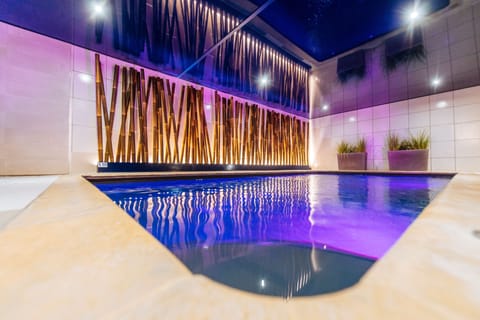 Indoor pool, open 7:00 AM to 10:00 PM, free cabanas, sun loungers