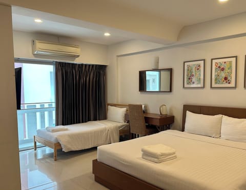 Superior Triple Room | Minibar, desk, iron/ironing board (on request)