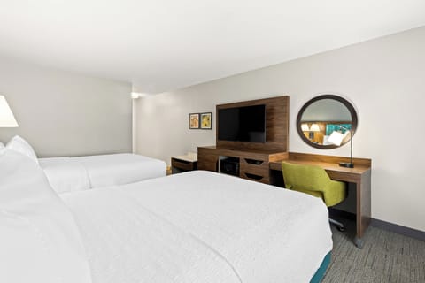 Premium bedding, desk, iron/ironing board, free cribs/infant beds