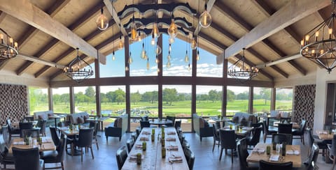 Breakfast, lunch, dinner served; golf course views