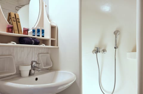 Shower, free toiletries, hair dryer, slippers