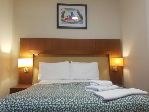 Standard Double Room | Blackout drapes, iron/ironing board, free WiFi, bed sheets