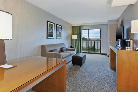 Suite, 1 Bedroom, Balcony | Living room | 32-inch LCD TV with cable channels, TV, pay movies