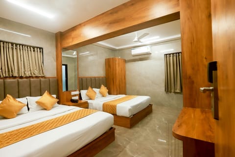 Deluxe Quadruple Room | Premium bedding, free WiFi, bed sheets