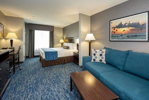 Desk, laptop workspace, iron/ironing board, free cribs/infant beds