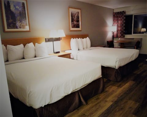 Standard Room, 2 Queen Beds | Individually decorated, blackout drapes, free WiFi, bed sheets
