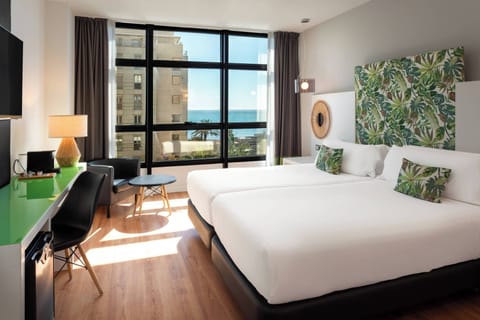 Premium bedding, down comforters, minibar, in-room safe