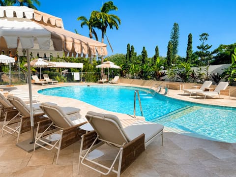 Outdoor pool, open 7:00 AM to 9:00 PM, pool umbrellas, sun loungers