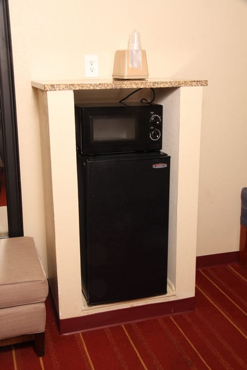 Desk, laptop workspace, blackout drapes, iron/ironing board