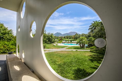 Seasonal outdoor pool, open 10:00 AM to 6:30 PM, pool umbrellas