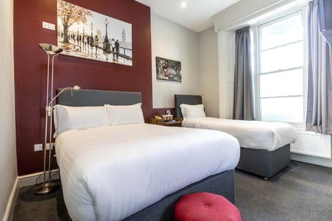 Family Room, Multiple Beds | Soundproofing, iron/ironing board, free WiFi, bed sheets