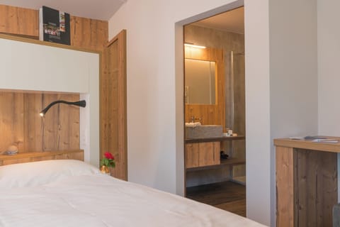 Premium bedding, down comforters, in-room safe, desk