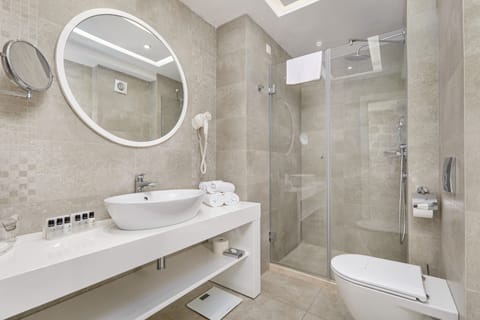 Shower, free toiletries, hair dryer, bathrobes