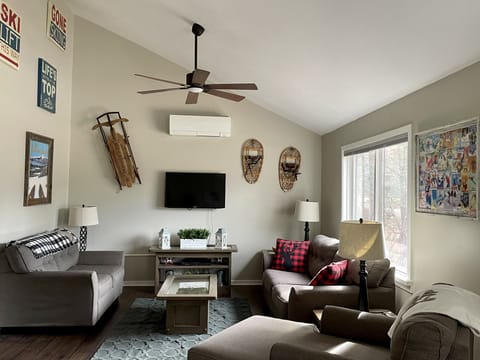 First floor main living room photo from dining area