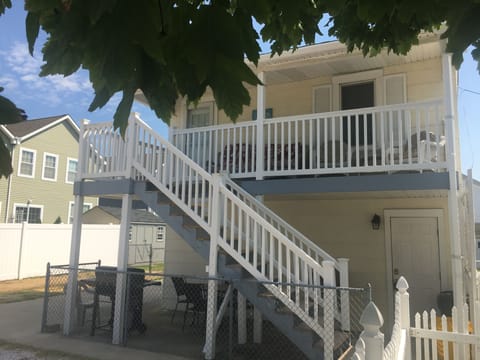 Exterior view of cottage, second floor covered porch