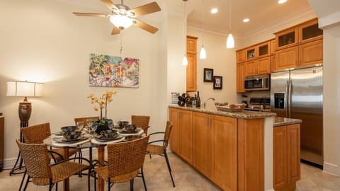 The fully equipped kitchen features top-of-the-line stainless steel appliances...