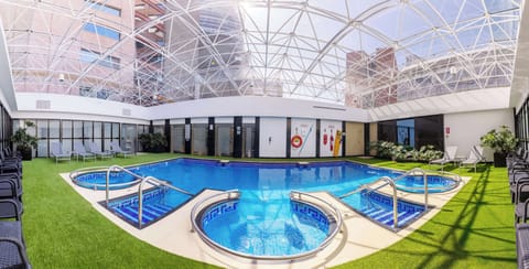 Indoor pool, open 6 AM to 8 PM, sun loungers