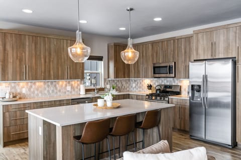 Large gourmet kitchen with additional seating