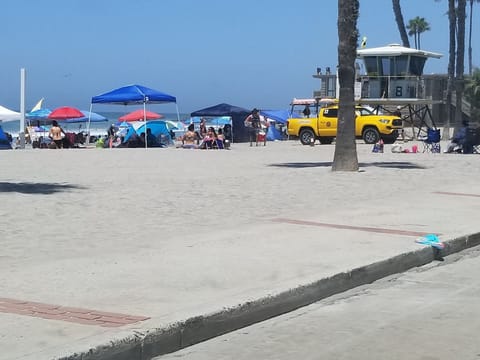Beach  accross from  House. just steps...tables, bbqs, new restrooms,volleyball!