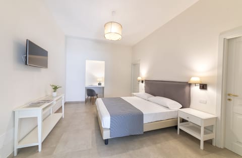 Quadruple Room, Non Smoking | In-room safe, free cribs/infant beds, free WiFi, bed sheets