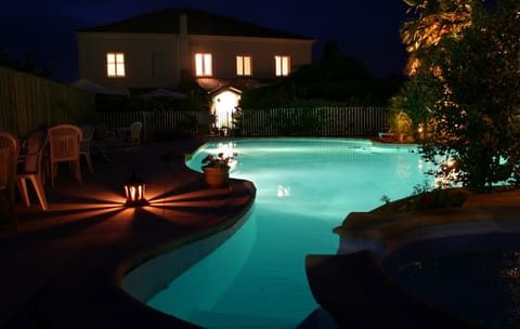 Outdoor pool, open 9 AM to 7 PM, sun loungers